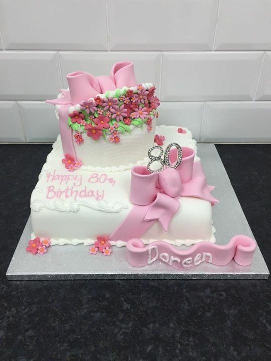 80th birthday cake with pink bows