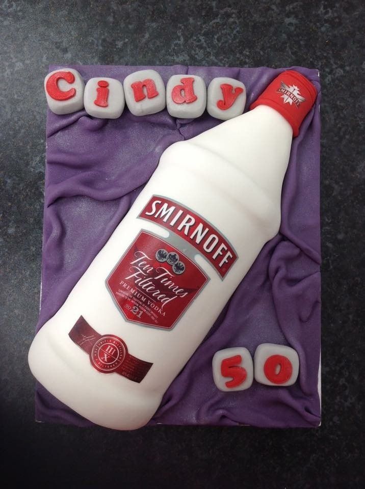50th birthday cake with vodka bottle