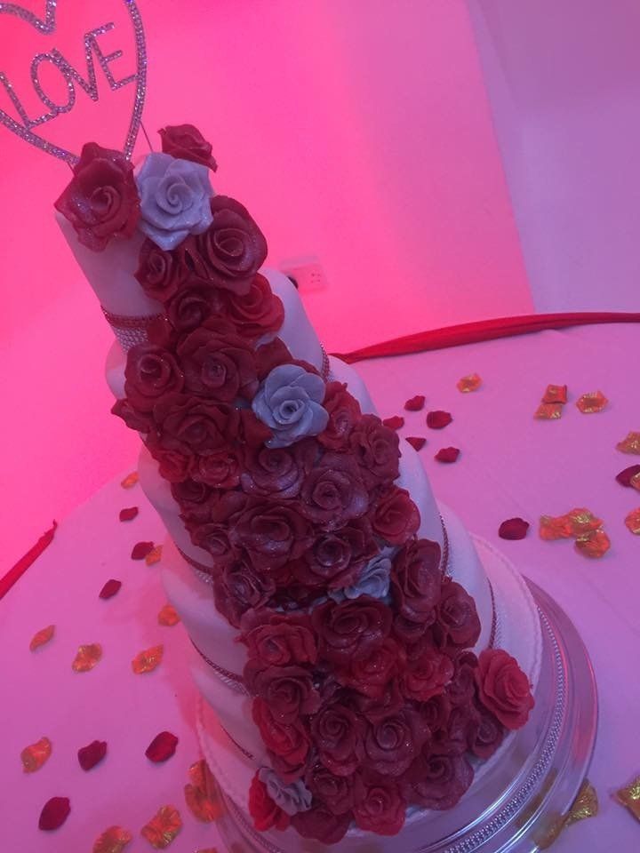 5 tier cake with waterfall of roses