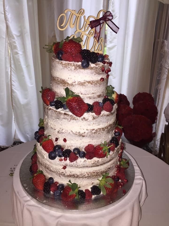 'naked' wedding cake with mixed fruit