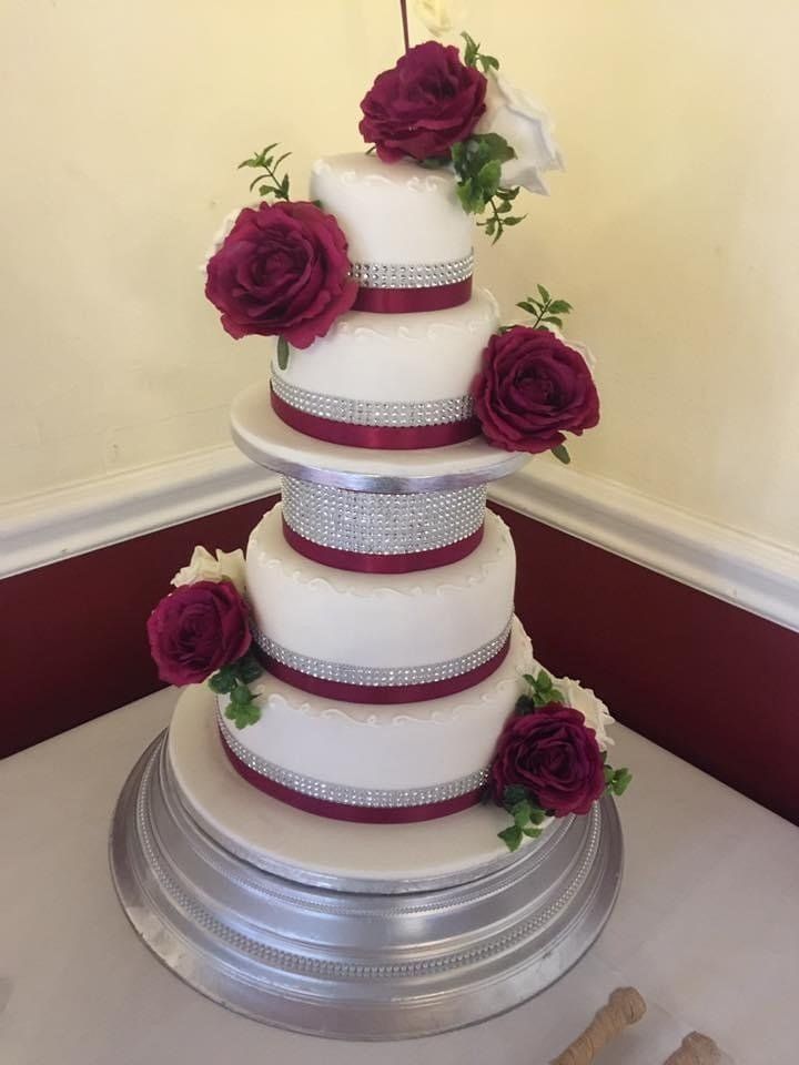 5 tier cake with red roses