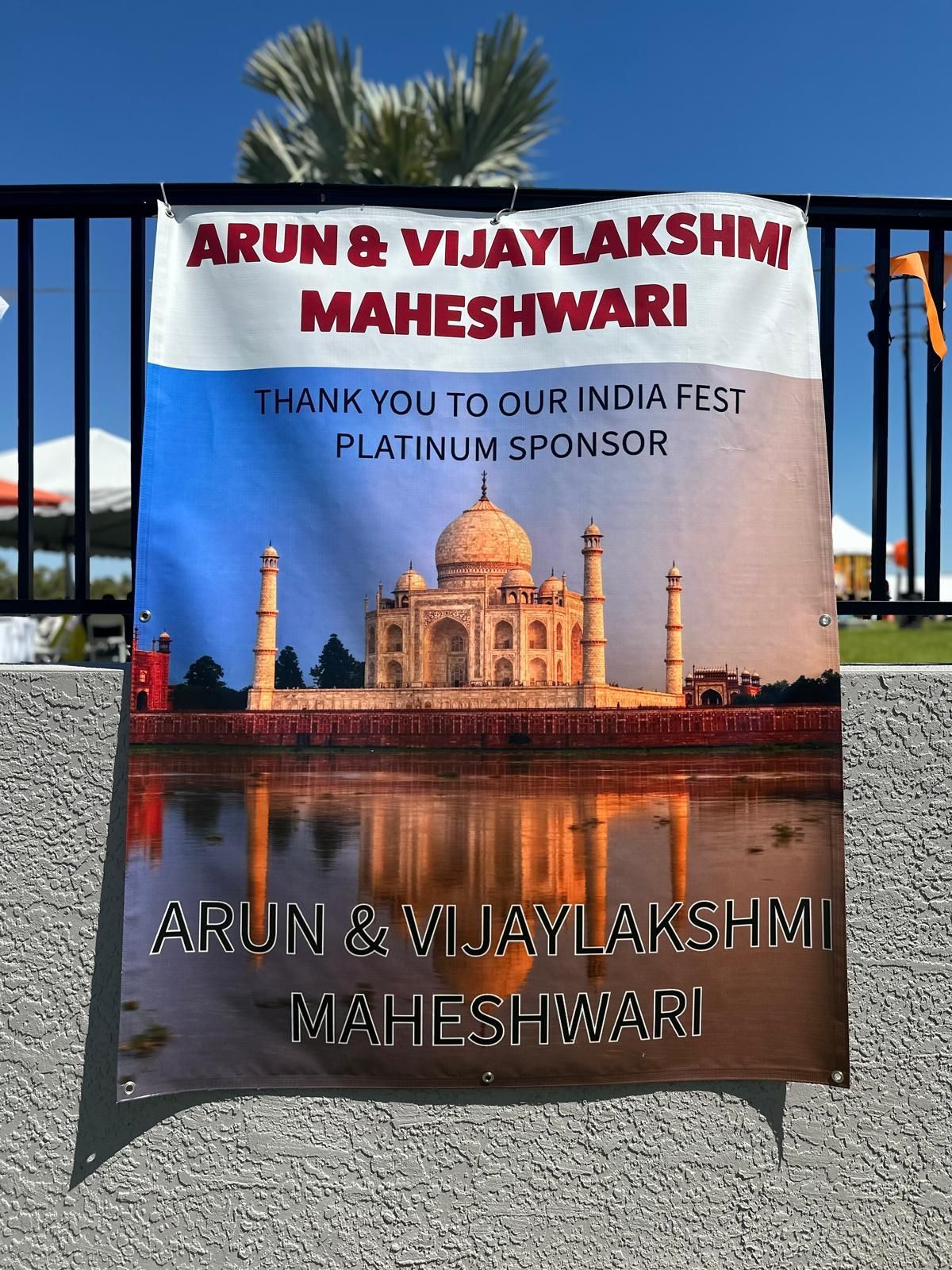 Banner: Arun & Vijaylakshmi Maheshwari, platinum sponsor, India Fest. Taj Mahal image.