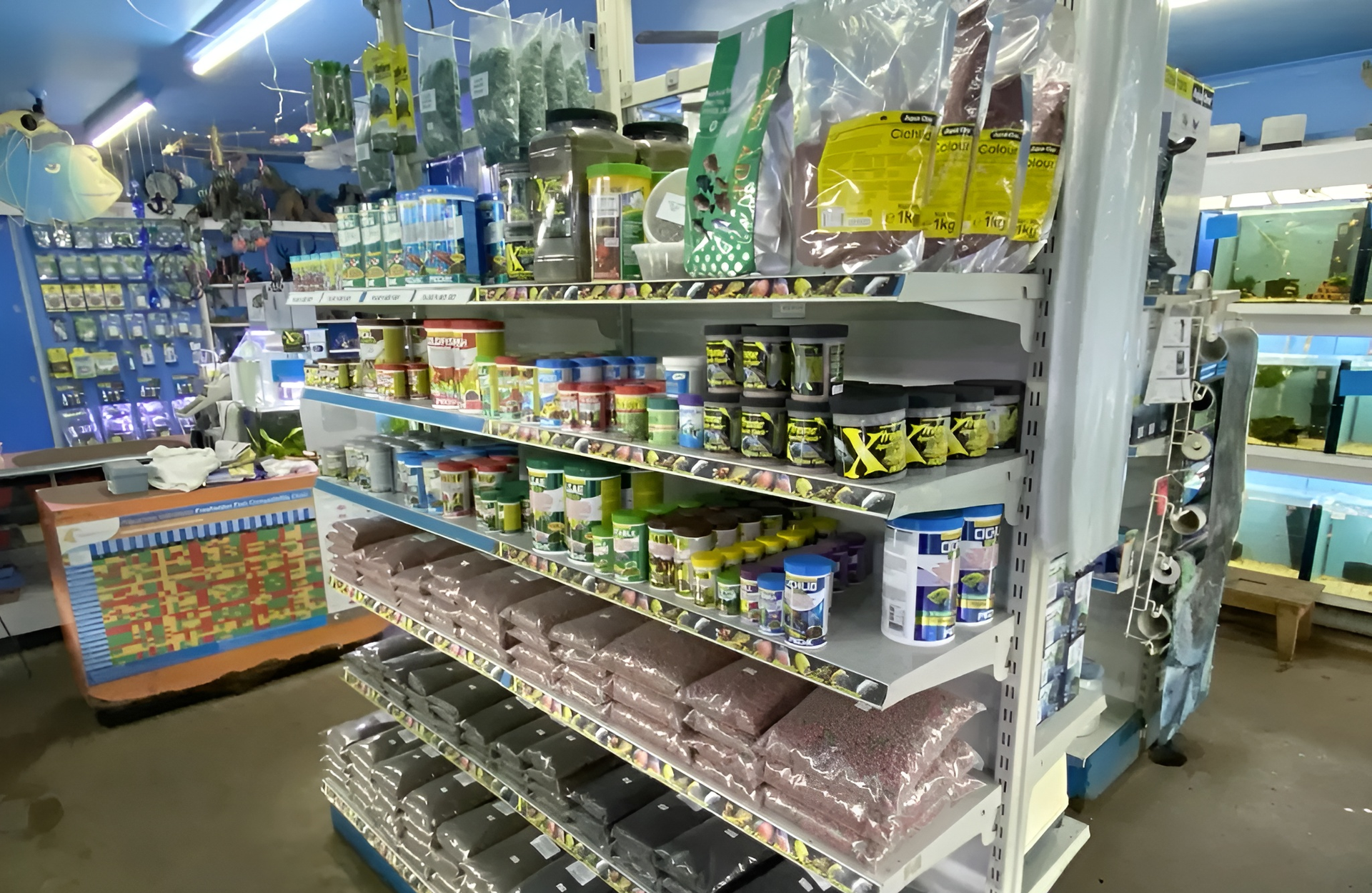 Shelves Stocked with Various Fish Food Products in An Aquarium Store — Summerland Aquarium in Wollongbar, NSW