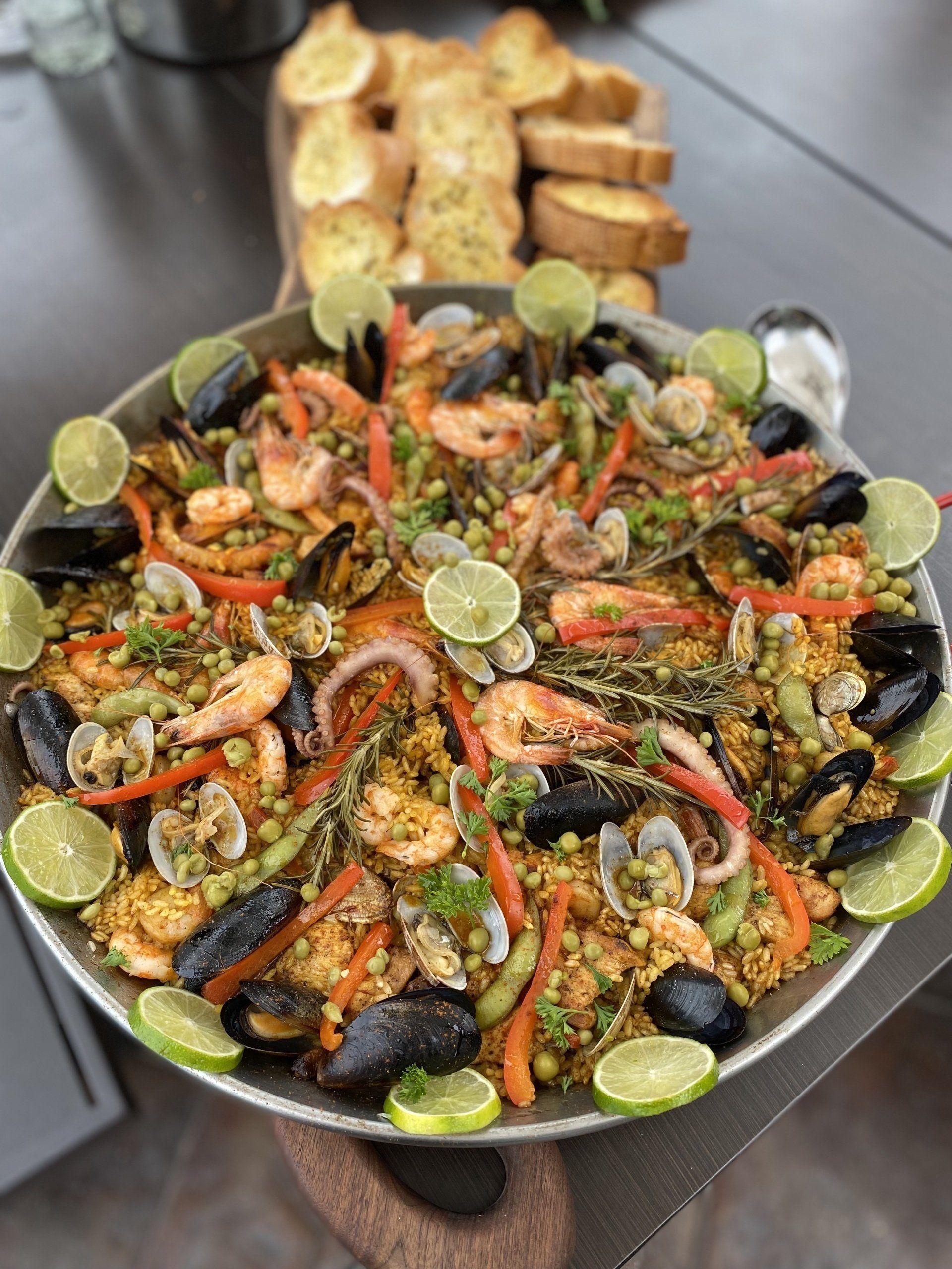Nine Tapas Catering offers delicious paella, tapas, and fusion cuisine