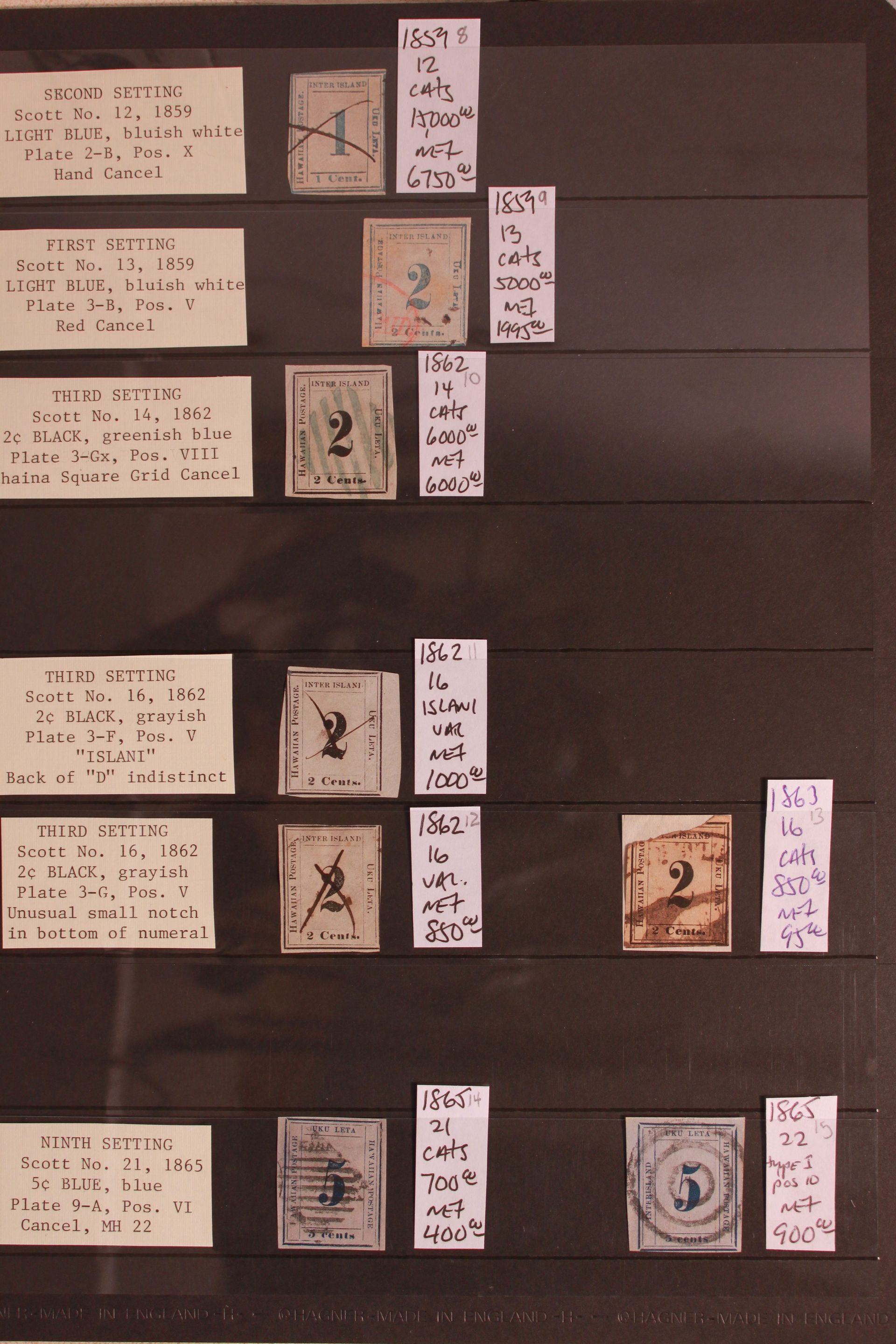 A collection of postage stamps including one with the number 2 on it.