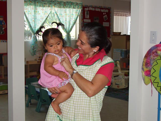 Woman holding a child - My Second Home - Concord, CA