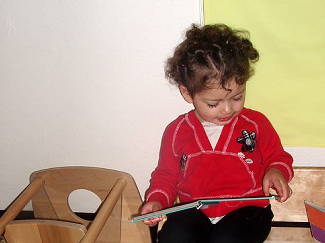 Girl reading picture book - My Second Home - Concord, CA