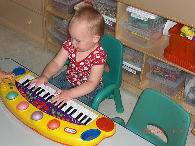 Girl playing with children piano keyboard - My Second Home - Concord, CA