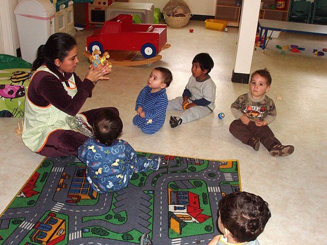 Toddlers listening attentively to teacher - My Second Home - Concord, CA