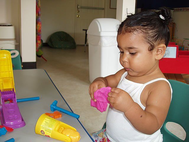 Little girl trying to blow bubbles - My Second Home - Concord, CA