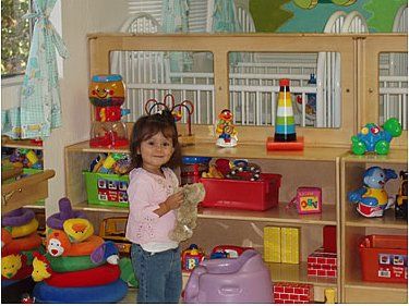 Little girl playing doll - My Second Home - Concord, CA