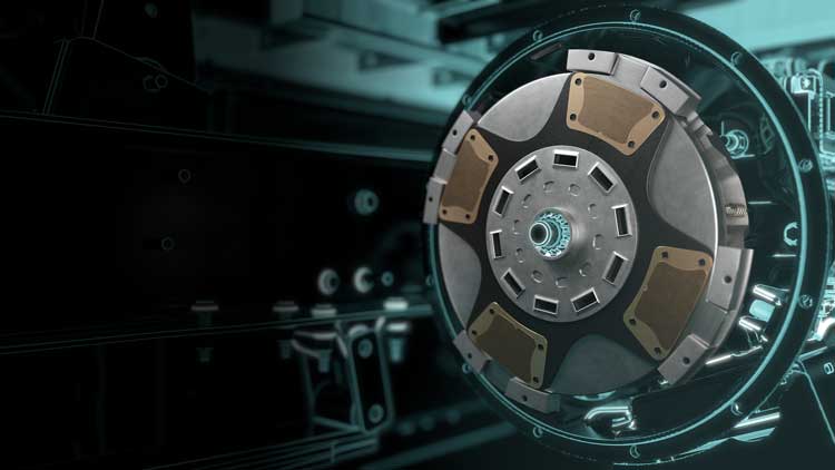 A close up of a clutch on a machine with a black background.