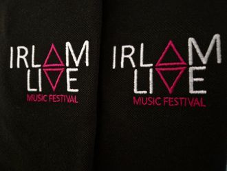 A black shirt with the words irlam live music festival embroidered on it