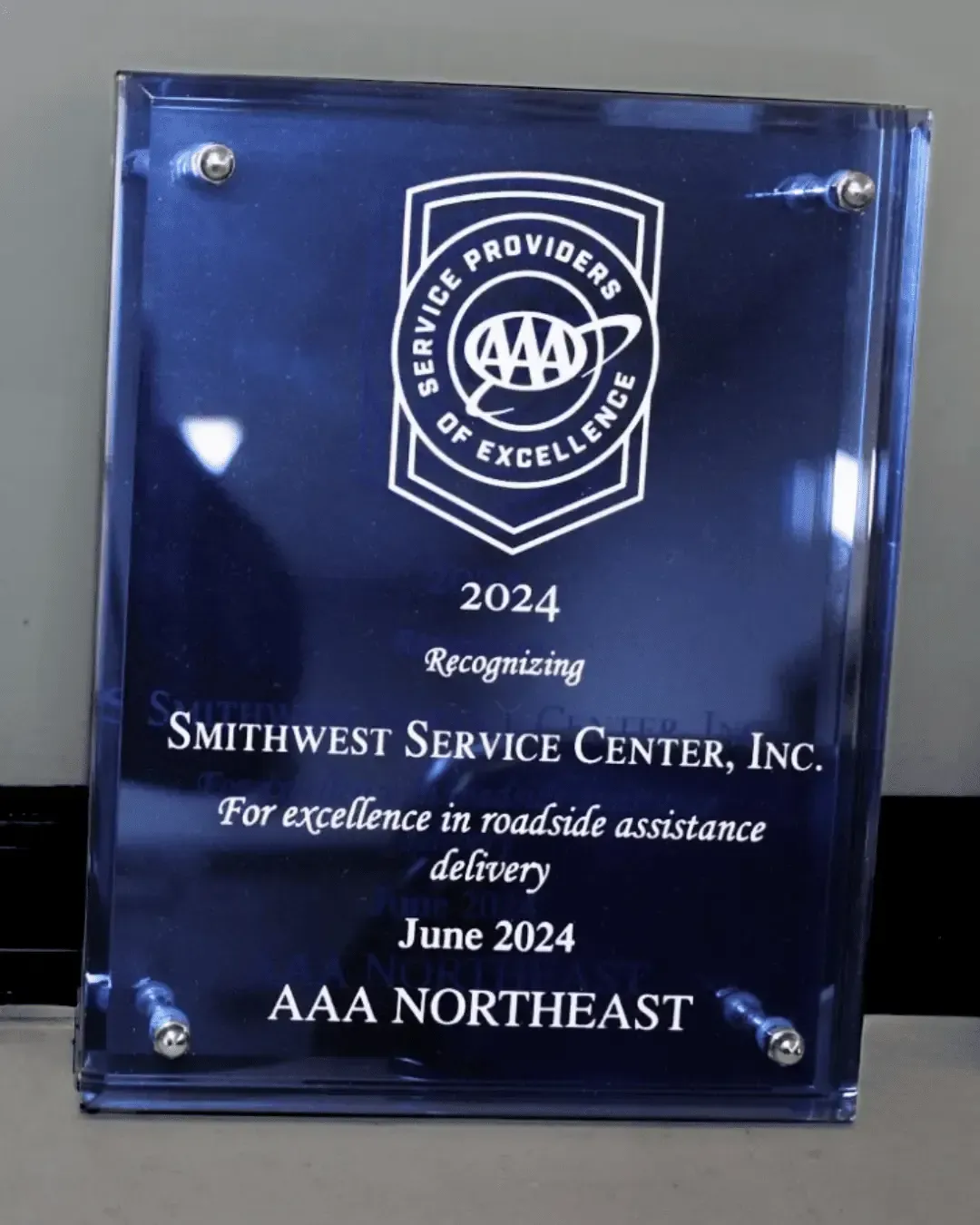 Plaque for Smithwest Service Center, Inc.  Recognizes excellence in roadside assistance delivery by AAA Northeast in 2024. | Smithwest Service Center