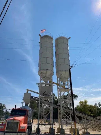 A large building is being built on a sunny day.