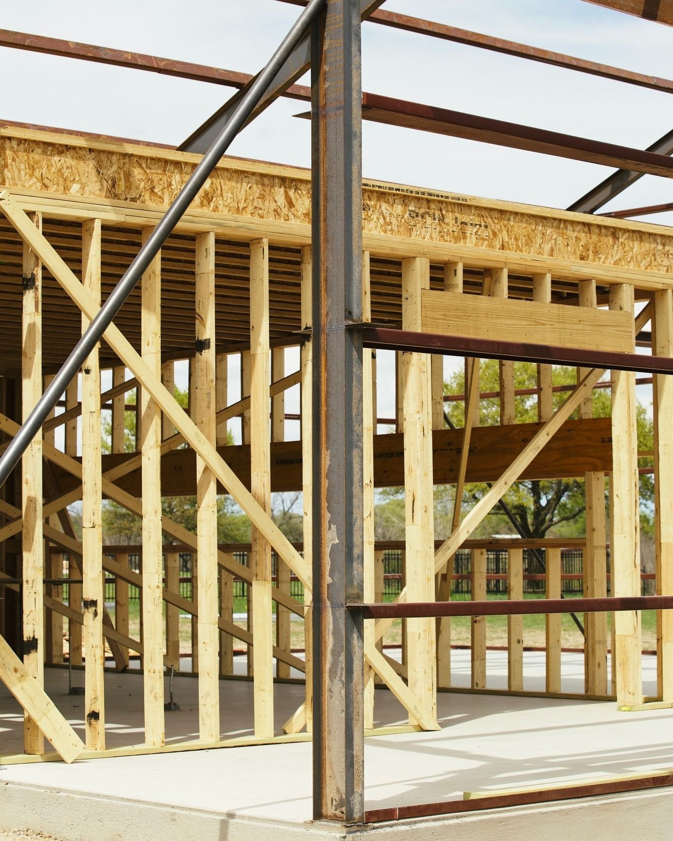 A wooden frame of a building under construction