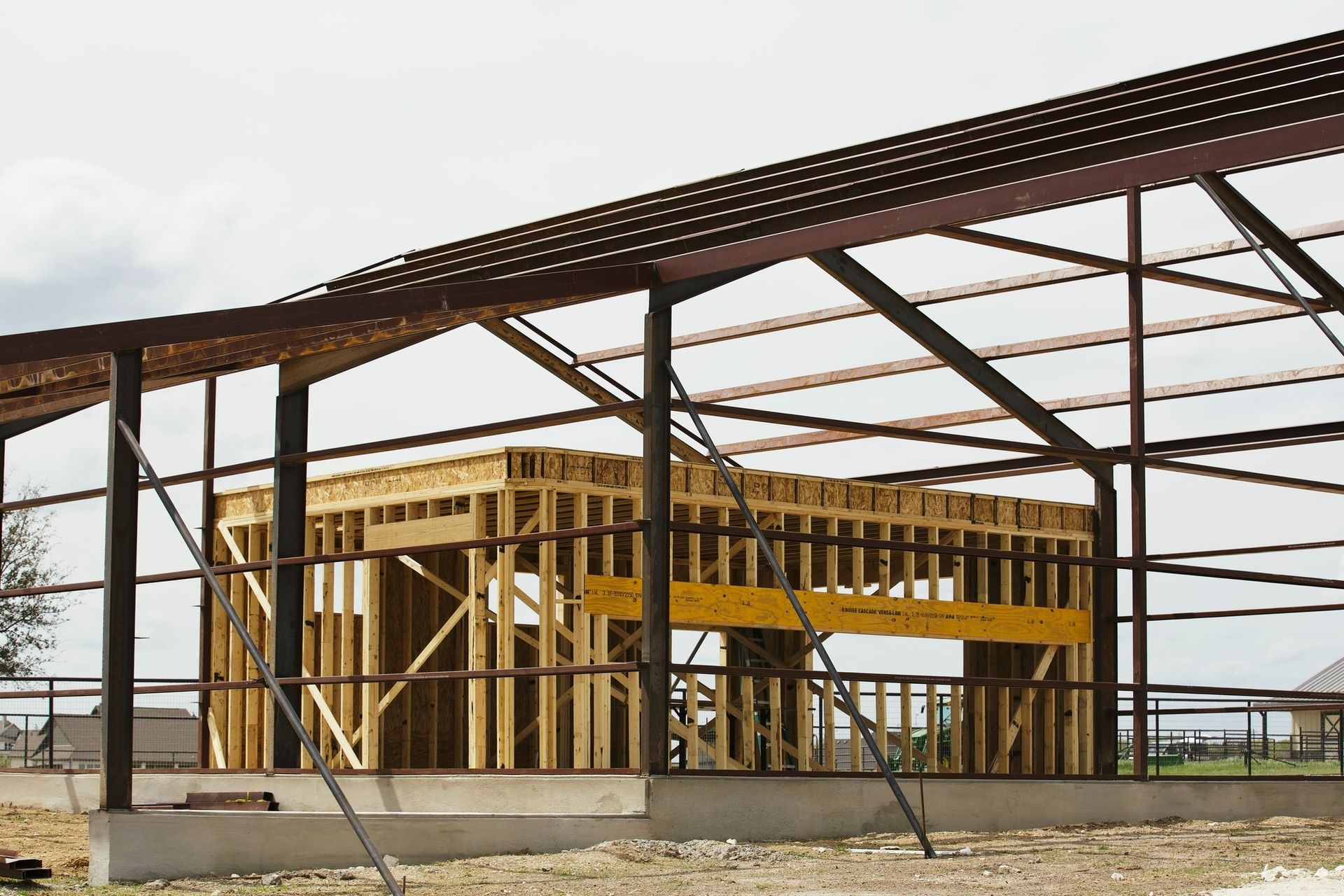 A building that is being built with wood and metal