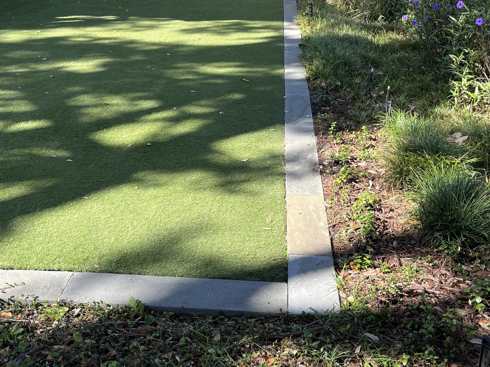 beautiful fake lawn in front yard of Tampa home
