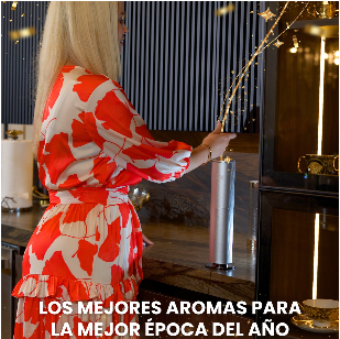 A woman in a red and white dress is holding a vase