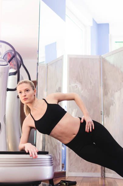 Woman Smiling While Doing Exercise — Noosaville Fitness Studio in Noosaville, QLD
