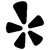 A black and white silhouette of a flower on a white background.