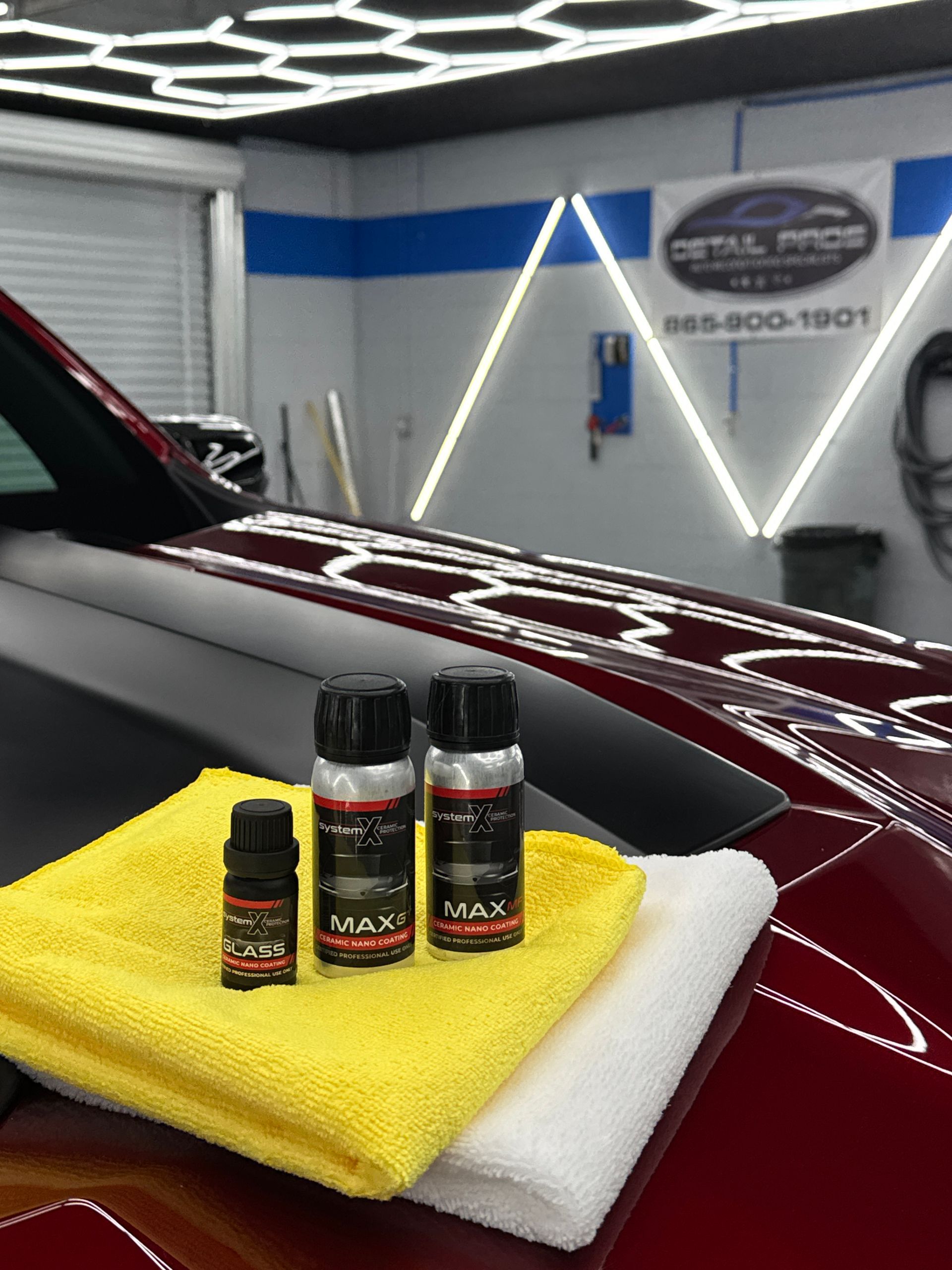 A white audi q5 is parked in a garage.