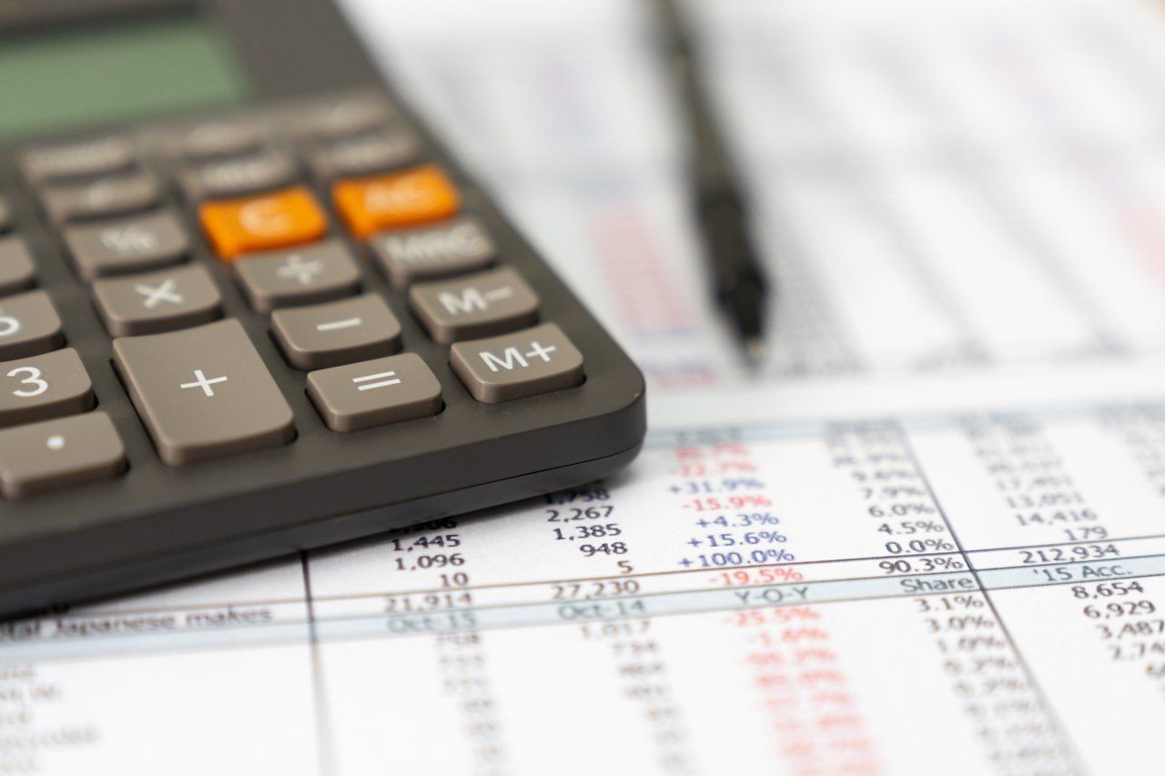 Tax Paper And Calculator — Nashville, TN — Warren, Denney & Wallace, CPA’s