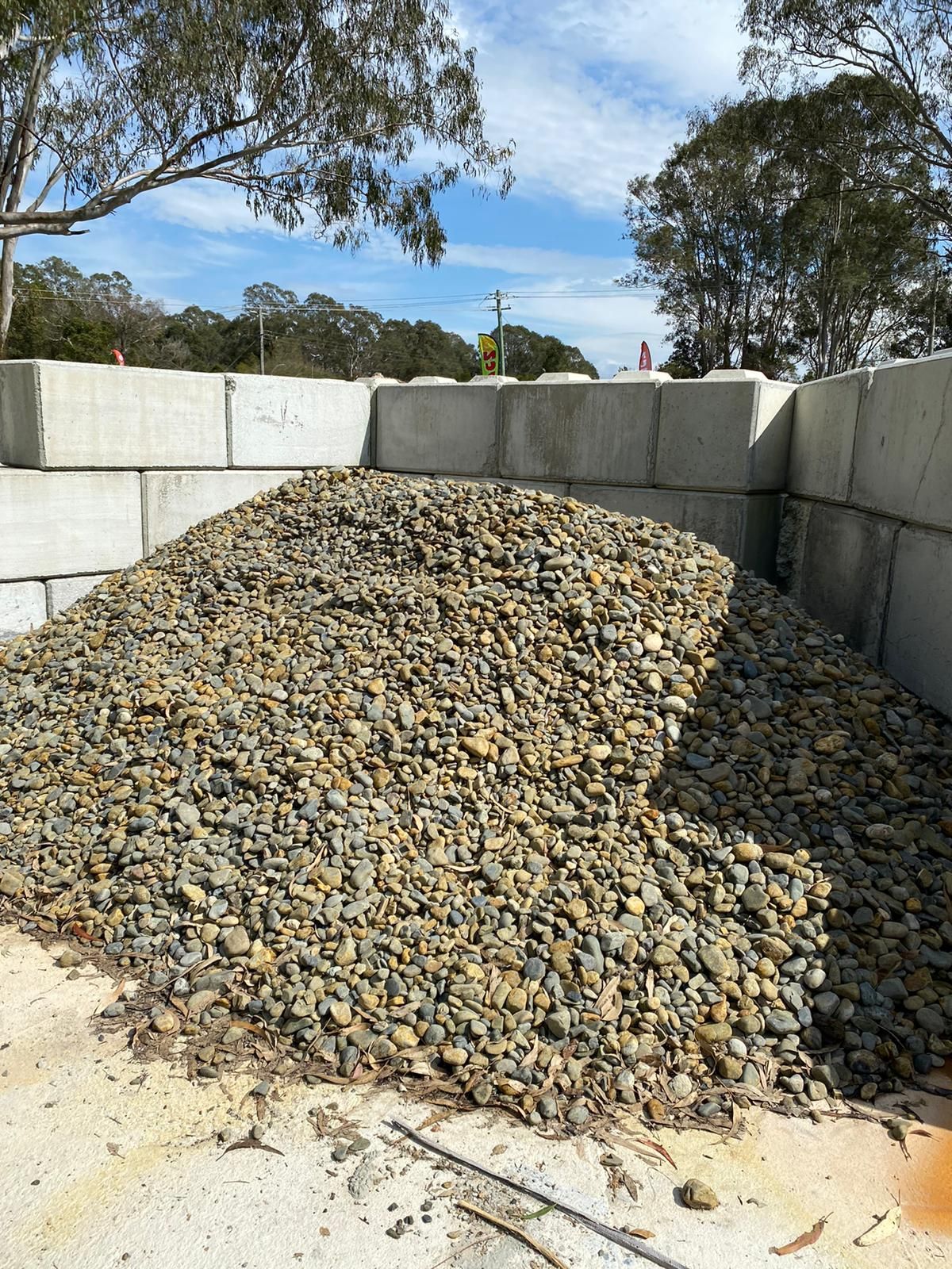 A Large Pile of Stones surrounding Brick Wall — Black Rock Garden Centre In Tyagarah, NSW