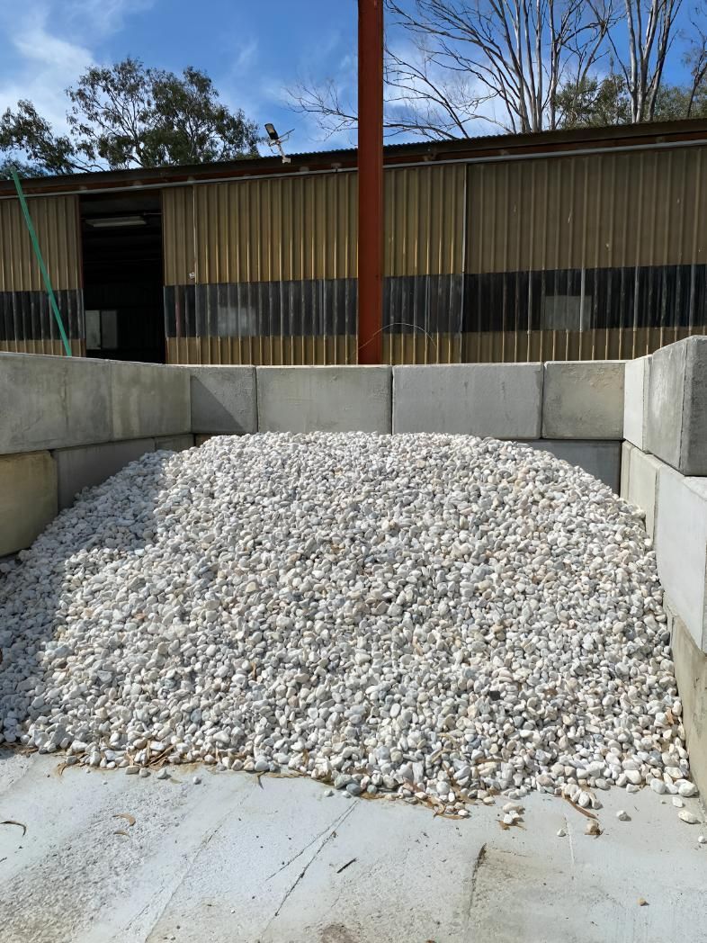 A Pile of Gravel is Sitting in Front of a Building — Black Rock Garden Centre In Tyagarah, NSW