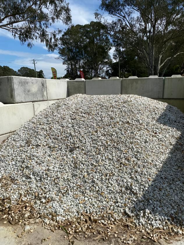 A Pile of Gravel is Sitting Next to a Pile of Concrete Blocks — Black Rock Garden Centre In Tyagarah, NSW