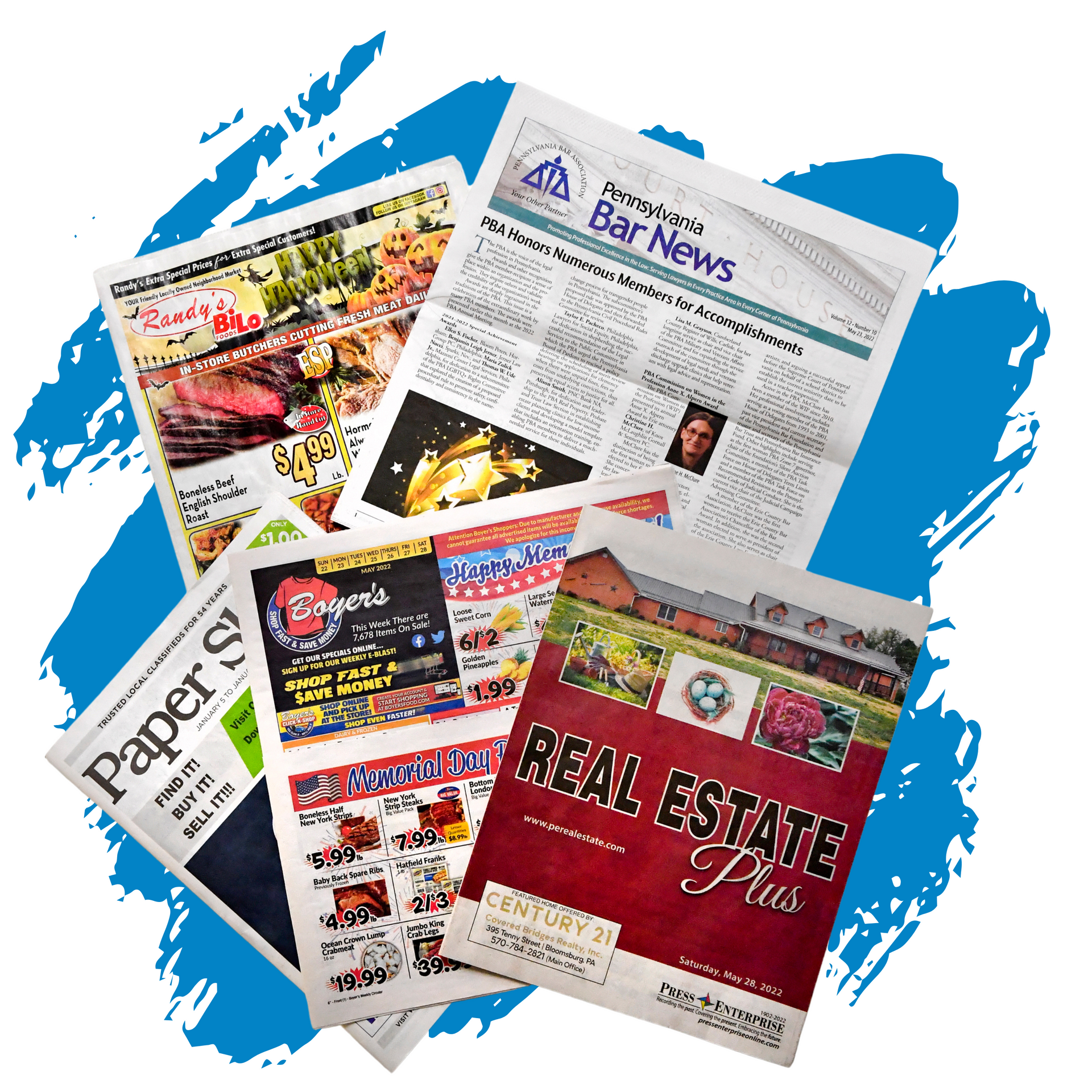 A bunch of newspapers including one that says real estate plus by press enterprise commercial printing