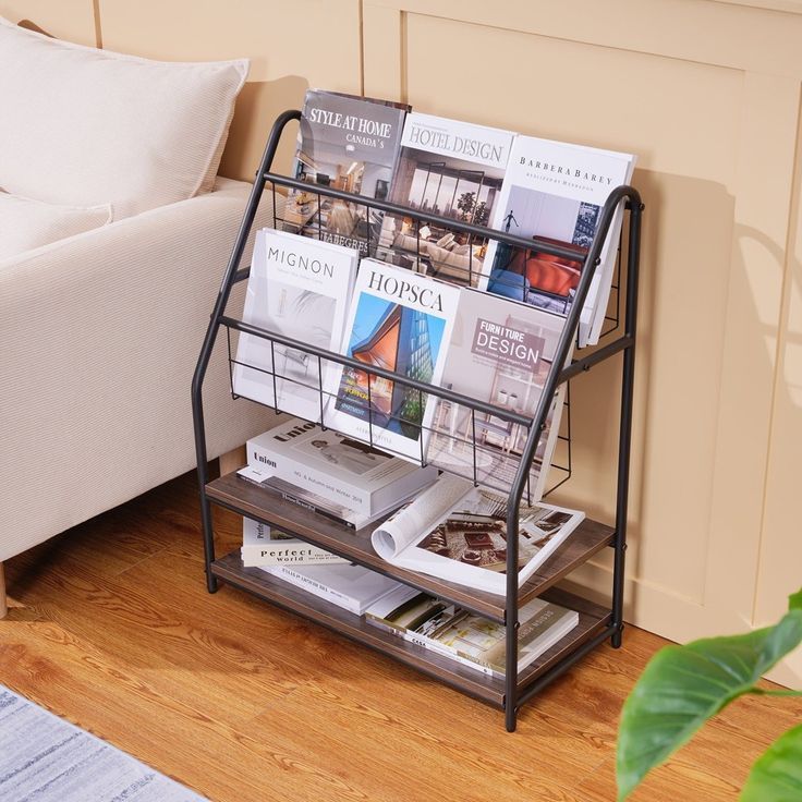 A magazine rack is sitting next to a couch in a living room.