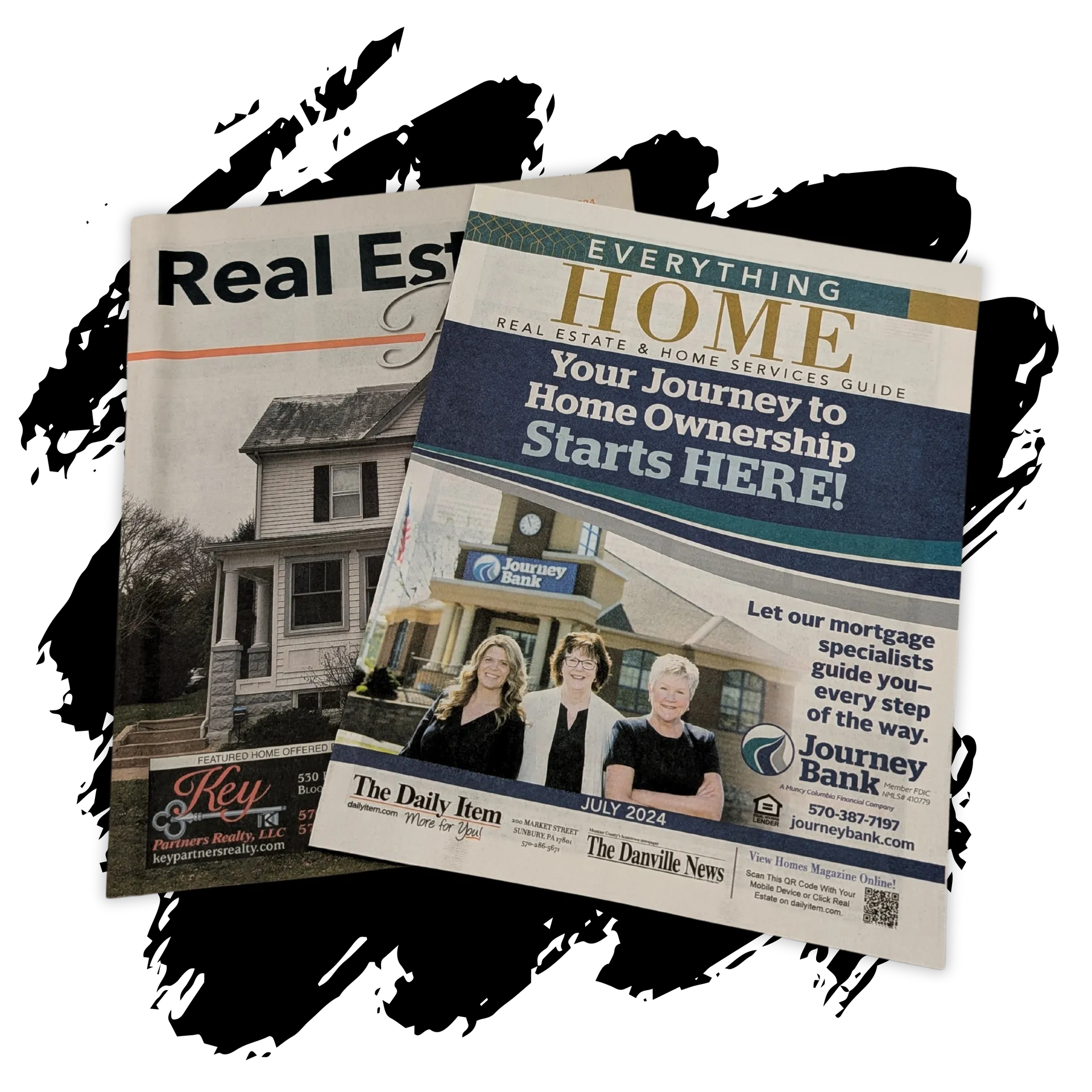 A real estate magazine is sitting on top of a newspaper