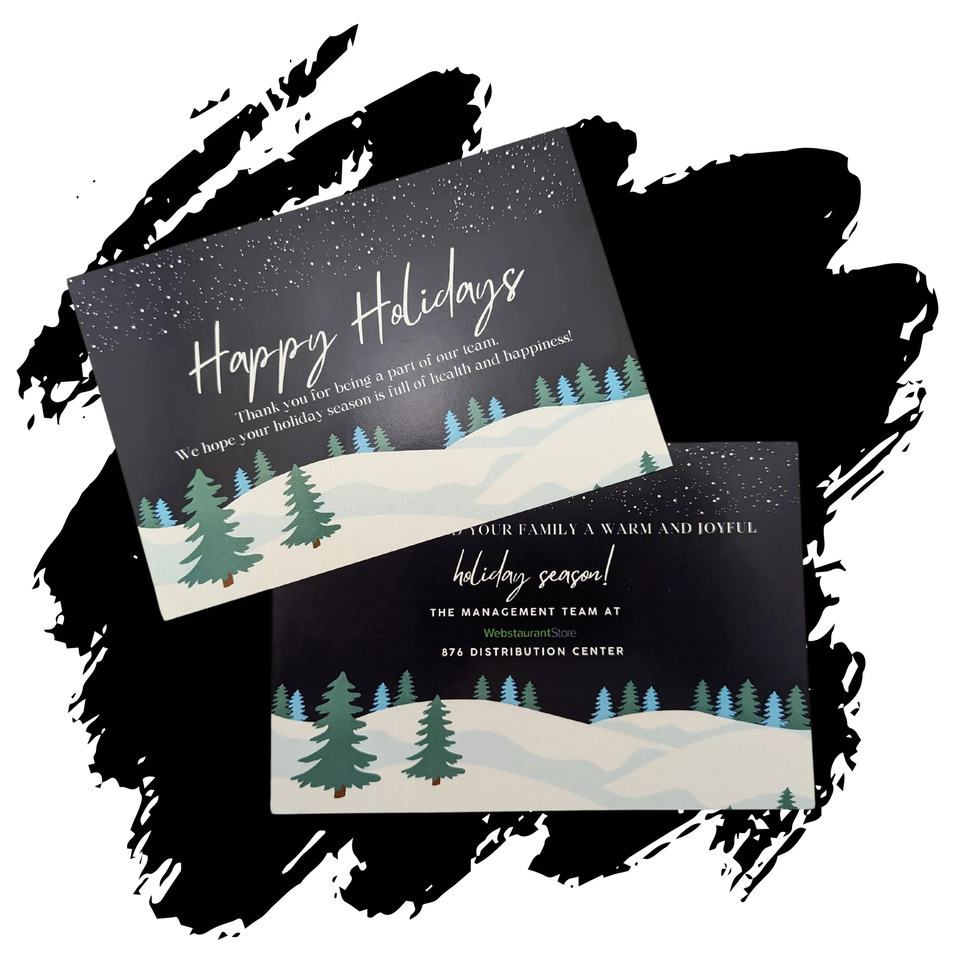 A couple of cards that say happy holidays on them
