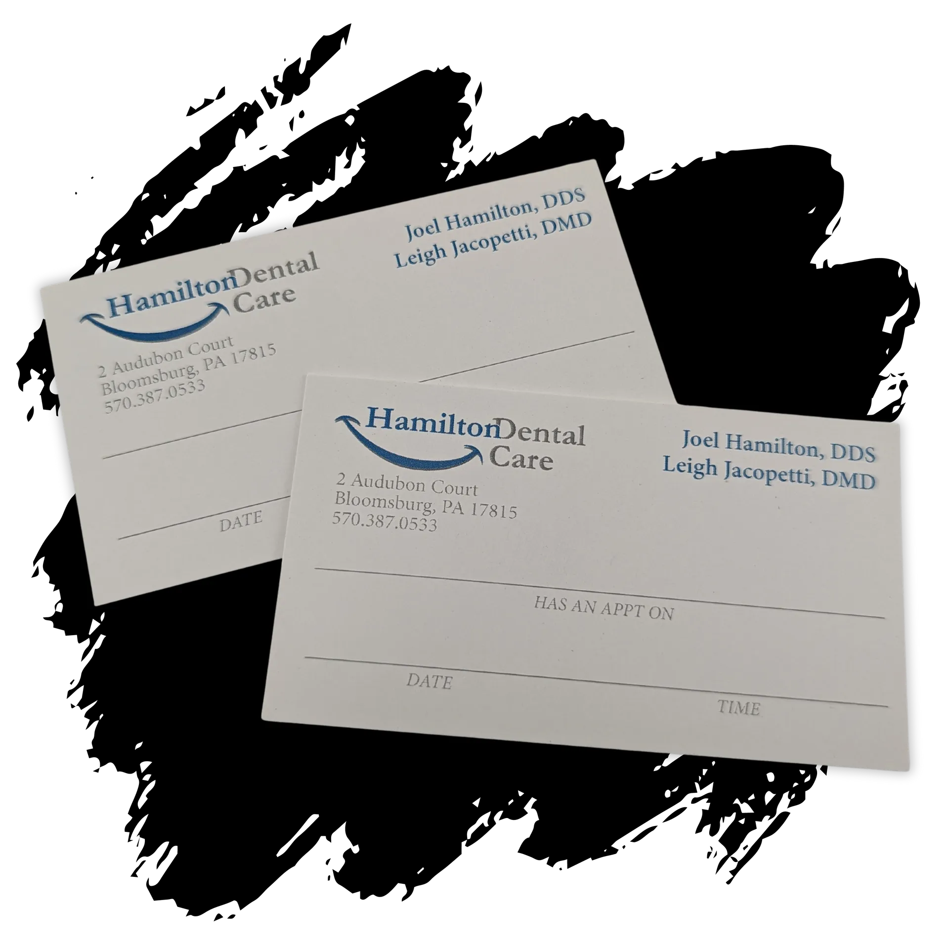 Three business cards for hamilton dental care on a black background