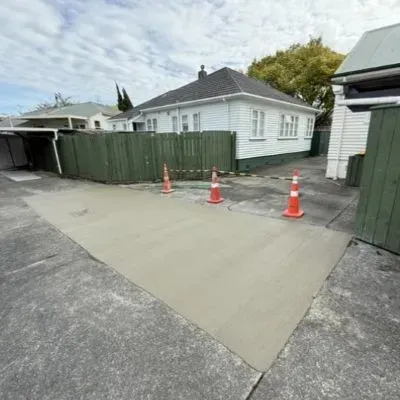 New broom finish concrete driveway 24m2 in Naenae, reconstructed after excavation by our concrete company.