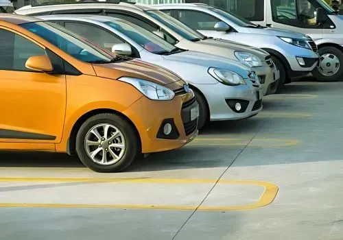 Cars are parked in a newly completed commercial concrete car park in Trentham.