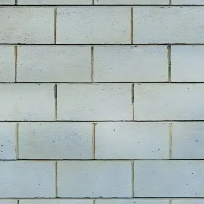 Concrete block retaining wall to hold back earth in Taita.