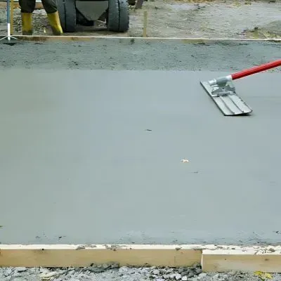 Concrete contractors finishing the foundation for a concrete shed slab for a customer in Maidstone, Upper Hutt.