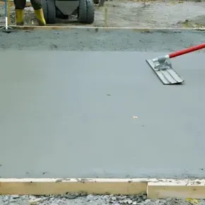 Concrete contractors finishing the foundation for a concrete shed slab for a customer in Maidstone, Upper Hutt.