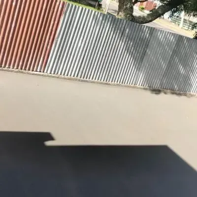 Aerial view of a concrete driveway in Epuni, Lower Hutt, showing the completed installation.