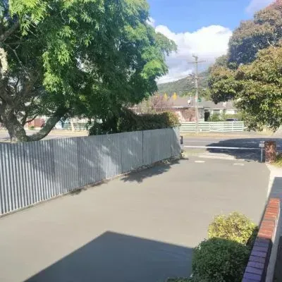 Rear view of a concrete driveway in Epuni, Lower Hutt, installed by our experienced contractors.