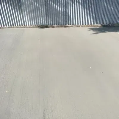 Side view of a concrete driveway in Epuni, Lower Hutt, installed by our team.