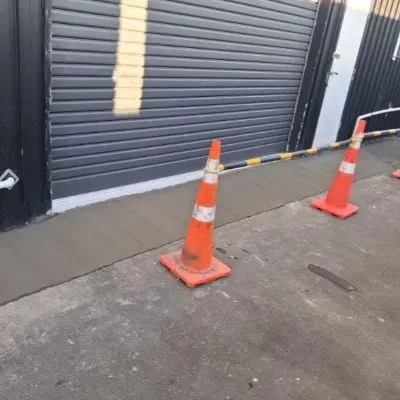 Concrete entrance roller door front view, CareVets veterinary clinic in Wainuiomata.