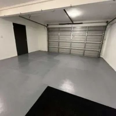 Full view of a new concrete garage floor in Pakuratahi, Upper Hutt, expertly laid by our concrete team.