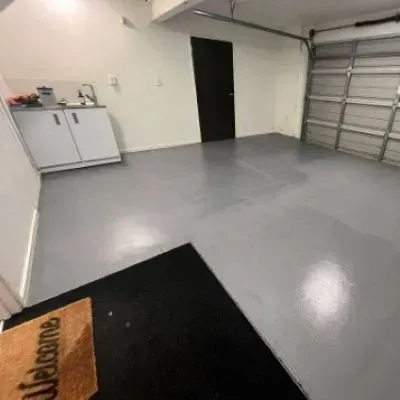 Side angle of a concrete garage floor in Pakuratahi, Upper Hutt, showing quality finish by our skilled contractors.