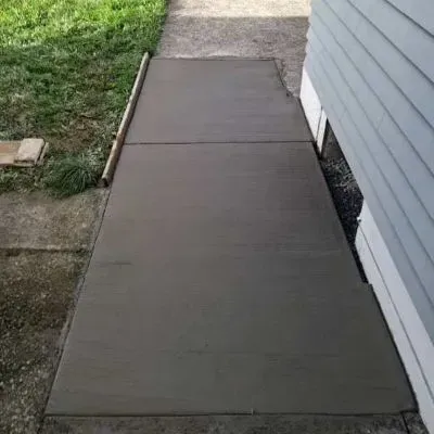 Front view of finished concrete path slab construction in Wainuiomata.