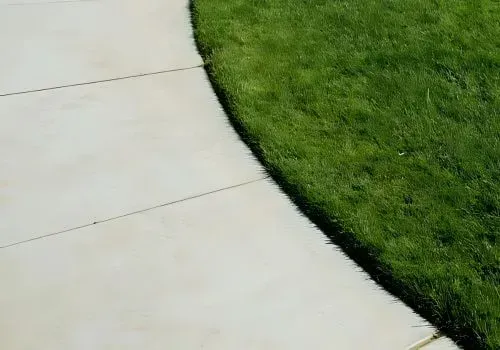 Close-up of a concrete path slab installed outside a Heretaunga home in Upper Hutt.
