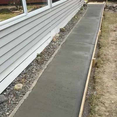 Rear view of a concrete path in Waterloo, Lower Hutt, showing the quality of the replacement job.