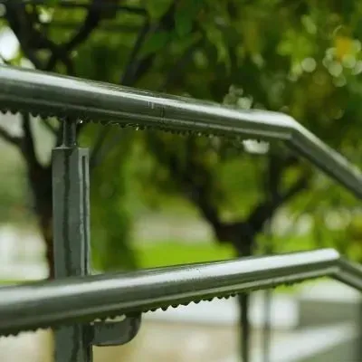 Concrete steps handrail at 1000mm height meeting NZ Building Code safety compliance requirements.